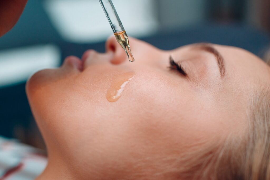 Woman with serum on her face